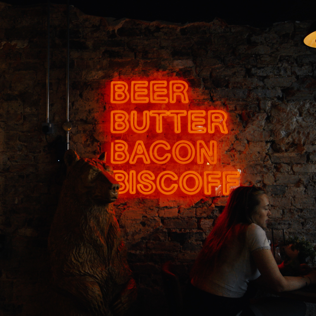 Neon signage above the bar